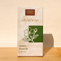 eKARoma Jasmine Aroma Oil packaging on a wooden surface with a beige background